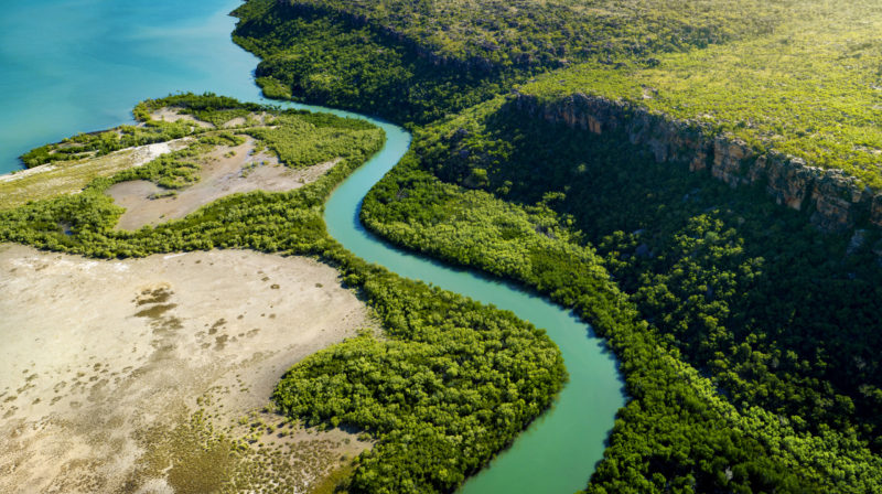 Aerial view of a Kimberley river and tree lined banks