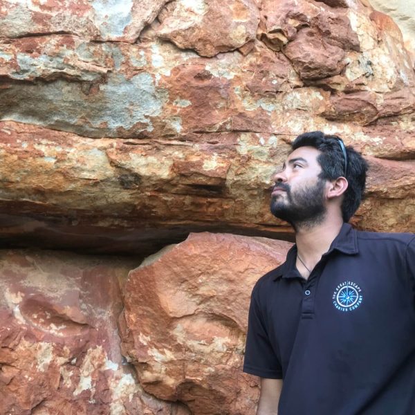 Man admiring rock formation